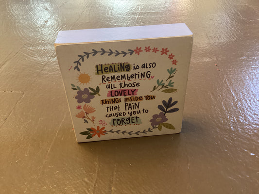 Healing is also remembering box sign